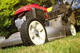 Image of lawn mower cutting grass