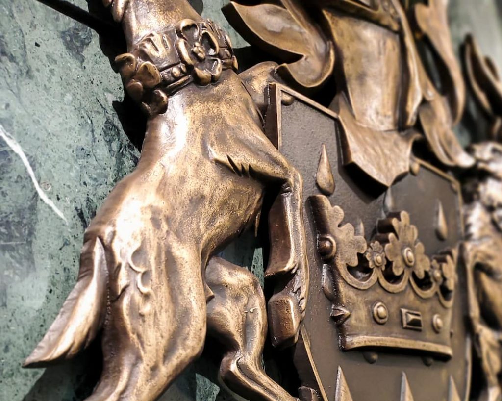 Close up view of Coat of Arms sculpture found in Leduc Council Chambers