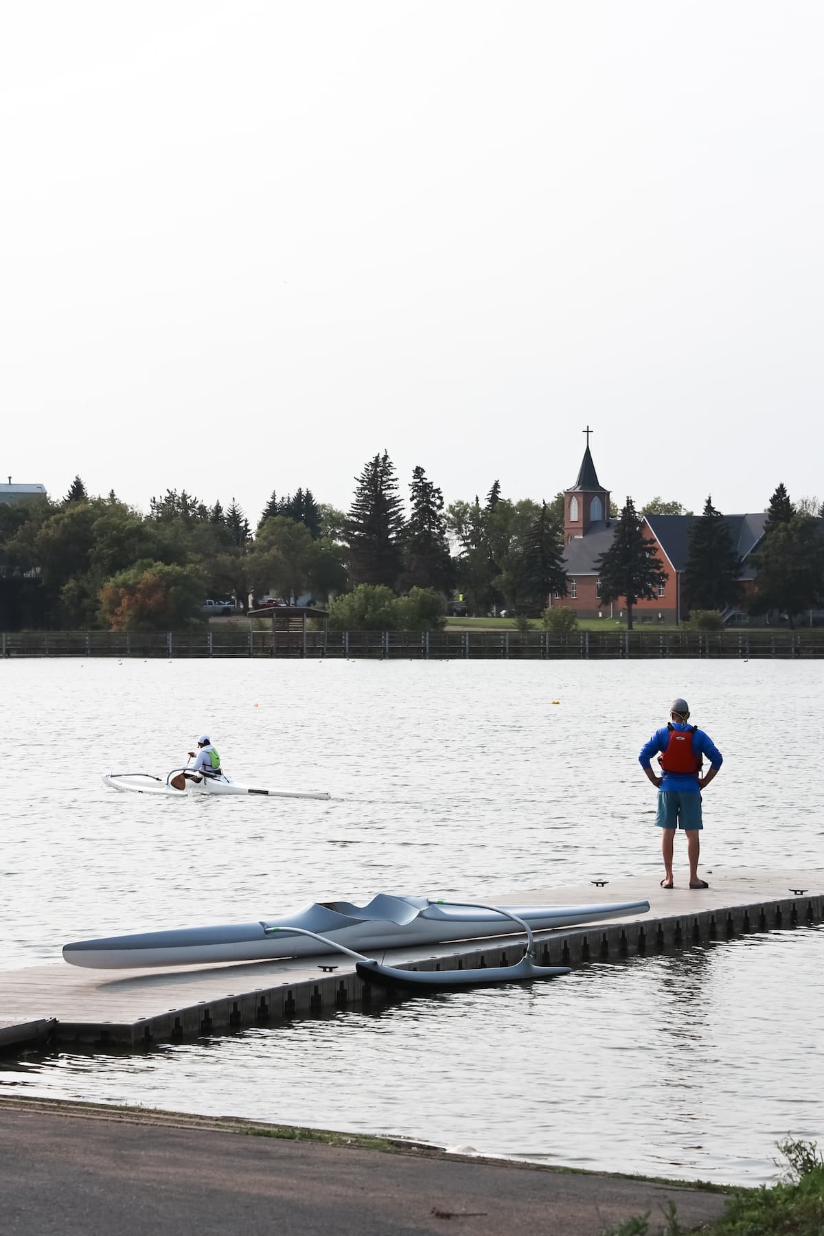 Leduc Boat Club with residents driving their boats in the lake