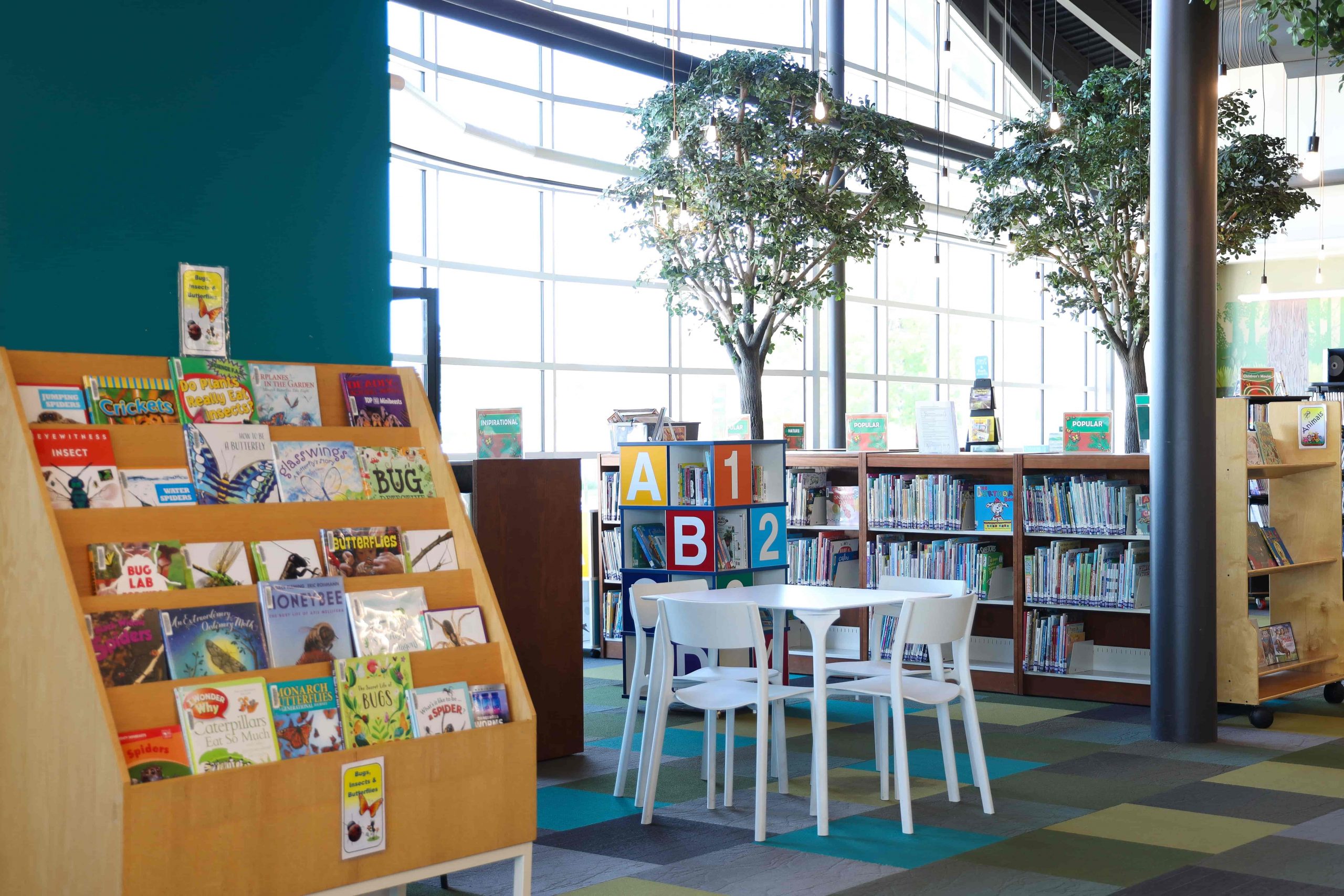 Childrens reading section with table and chairs at Leduc Public Library