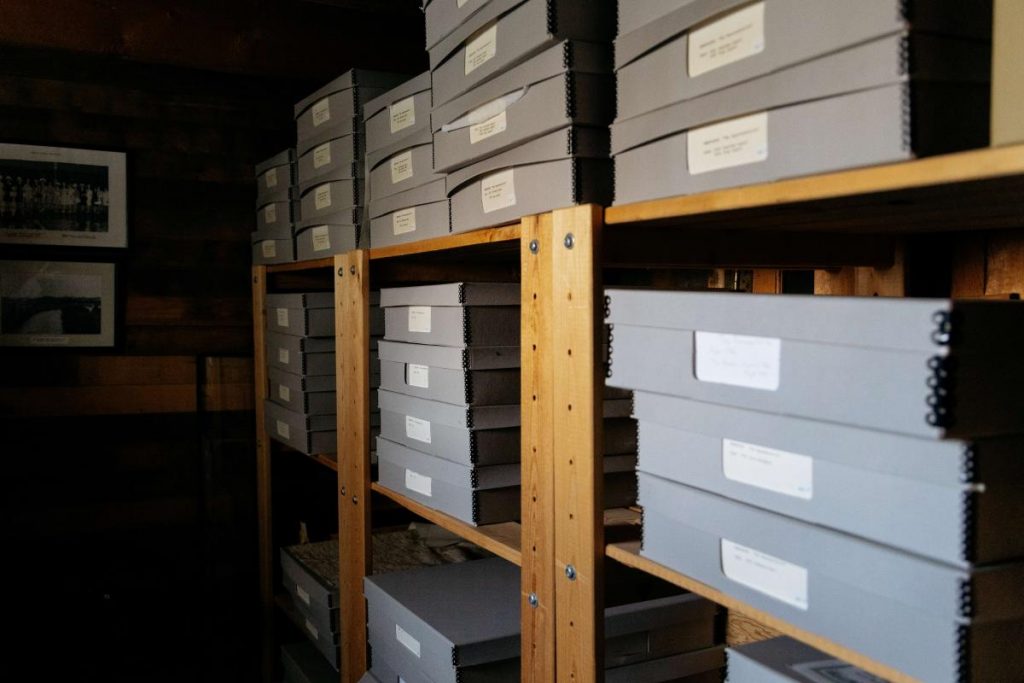 Artifact storage boxes stacked on shelves