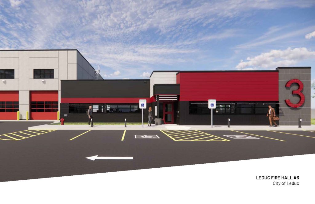 Front view of Leduc Fire Hall #3, featuring red and black accents, with parking spots and clear sky background.