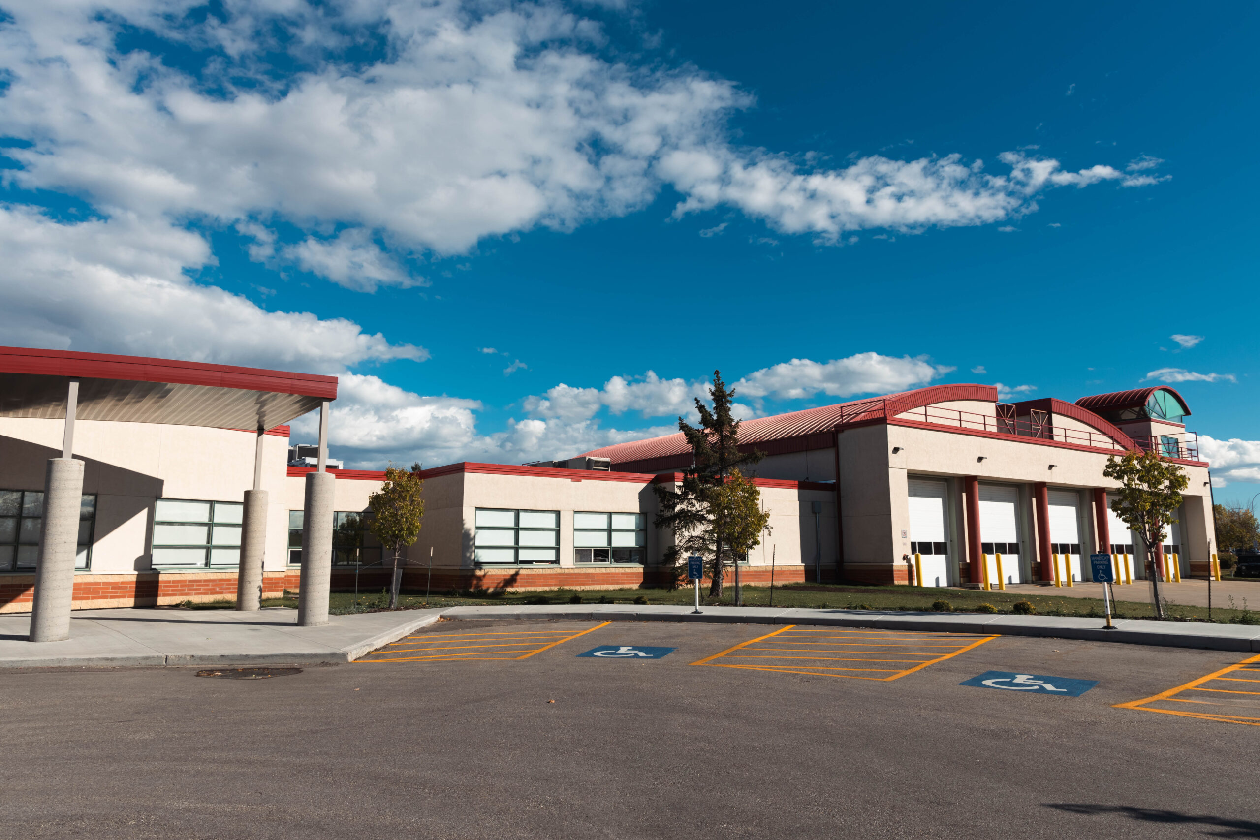 landscape photo of Fire Hall 1 in Leduc with blue cloudy sky